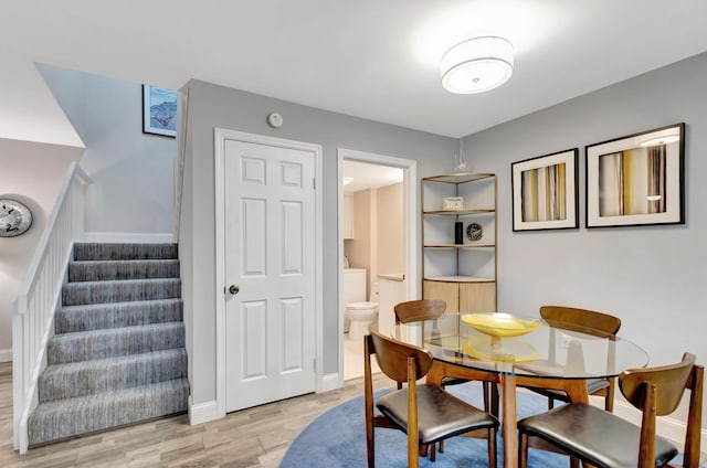 dining area with light wood-type flooring