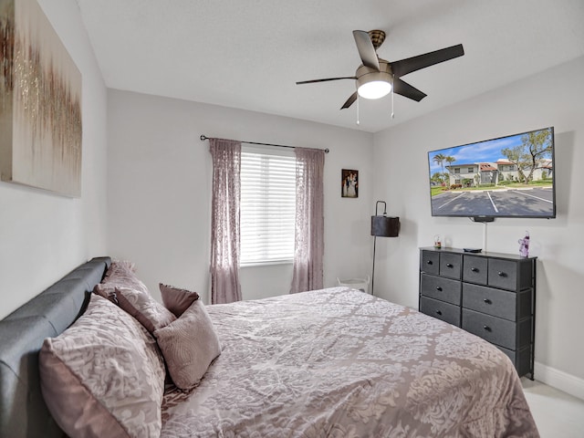 bedroom featuring ceiling fan