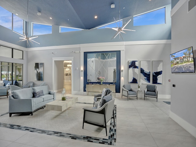 living room featuring an inviting chandelier, high vaulted ceiling, and light tile patterned flooring