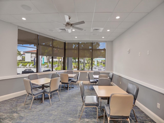 dining room featuring a paneled ceiling and ceiling fan