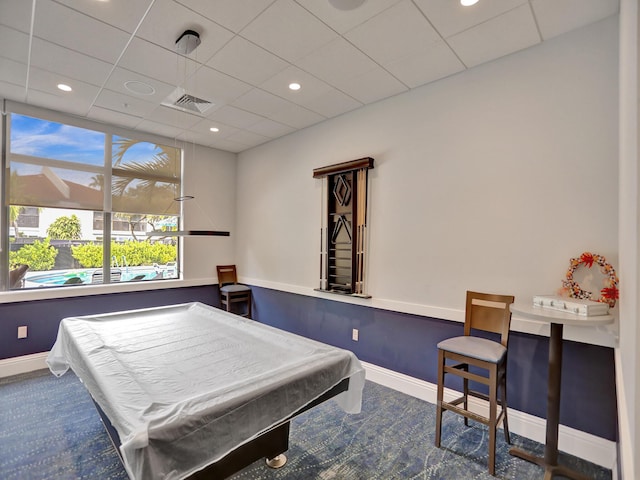 game room with a drop ceiling and billiards