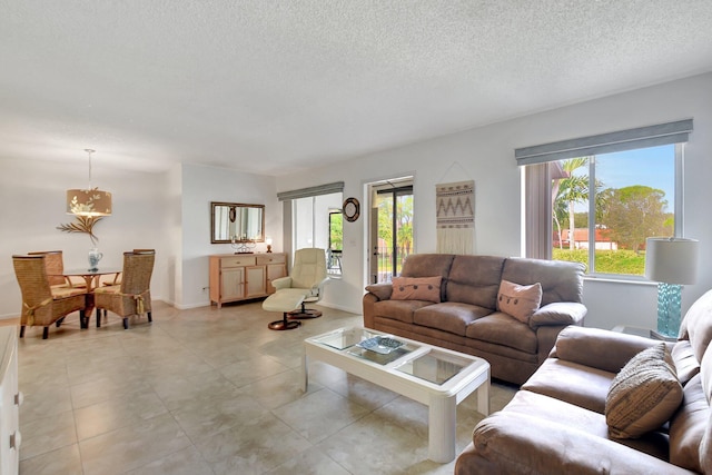 living room featuring a textured ceiling