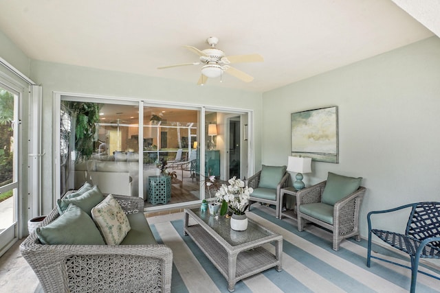 sunroom / solarium with ceiling fan