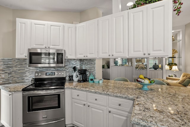 kitchen with white cabinets and stainless steel appliances