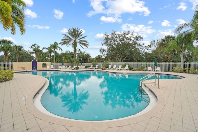 view of pool featuring a patio area