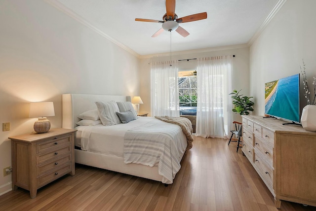 bedroom with light wood-type flooring, access to exterior, a ceiling fan, and crown molding