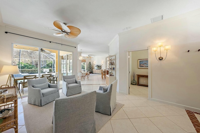 tiled living room with ceiling fan and ornamental molding