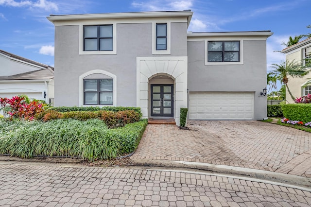 view of front of property featuring a garage