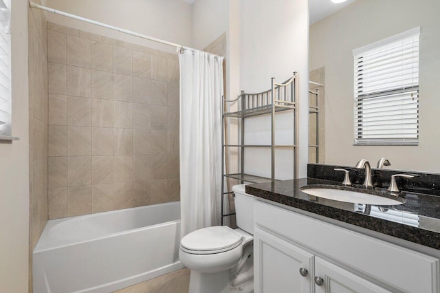 full bathroom featuring shower / bath combination with curtain, toilet, and vanity