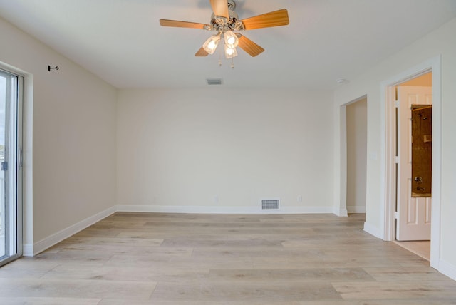 spare room with ceiling fan and light hardwood / wood-style flooring