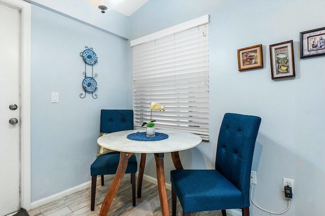 dining room with light wood-type flooring