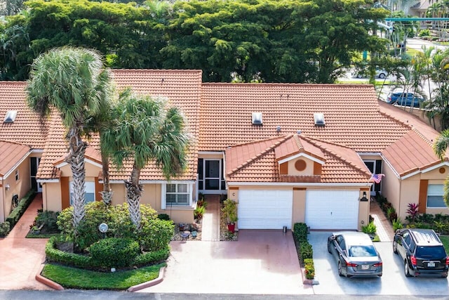 view of front of property with a garage