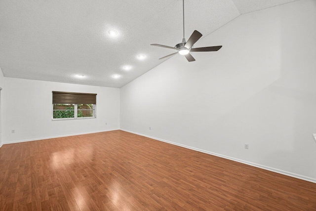 9904 Summerbrook Ter Unit C, Boynton Beach, FL 33437 - unfurnished room with lofted ceiling, wood finished floors, a textured ceiling, ceiling fan, and baseboards