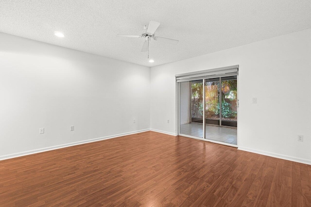 9904 Summerbrook Ter Unit C, Boynton Beach, FL 33437 - unfurnished bedroom with access to exterior, wood finished floors, baseboards, recessed lighting, and a textured ceiling