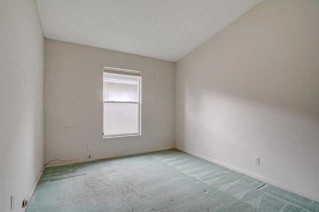 spare room with carpet flooring