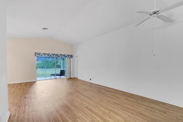 unfurnished living room with ceiling fan, light wood-type flooring, and vaulted ceiling