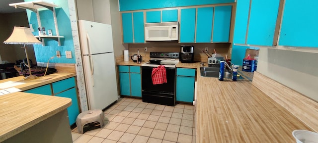 kitchen featuring light tile patterned flooring, white appliances, blue cabinets, and sink