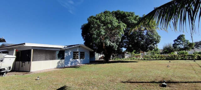 view of property exterior featuring a yard