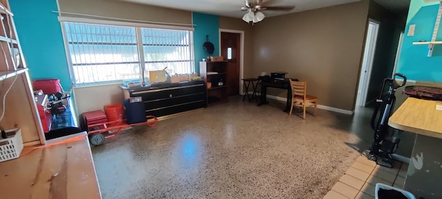 miscellaneous room featuring ceiling fan