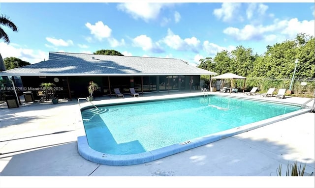 view of pool featuring a patio