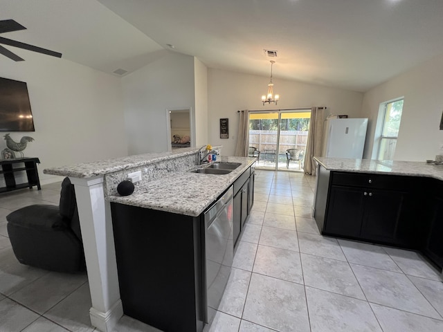 kitchen with a kitchen island with sink, sink, vaulted ceiling, and dishwasher