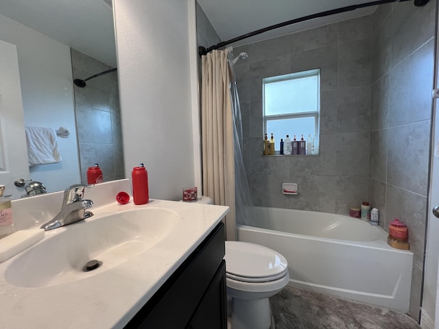 full bathroom featuring vanity, toilet, and shower / tub combo