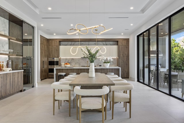 dining area featuring a chandelier