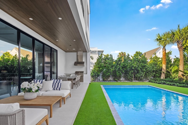 view of pool featuring an outdoor hangout area, an outdoor bar, and a patio area