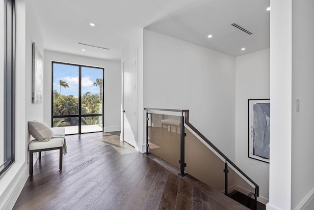 interior space with dark hardwood / wood-style floors