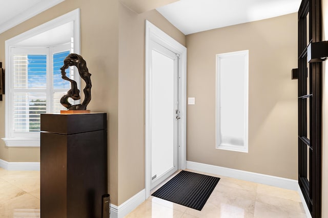 entrance foyer with light tile patterned flooring