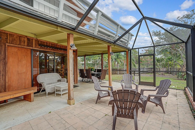 view of patio / terrace with glass enclosure