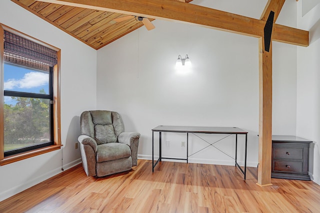 living area with wood ceiling, vaulted ceiling with beams, ceiling fan, and light hardwood / wood-style floors