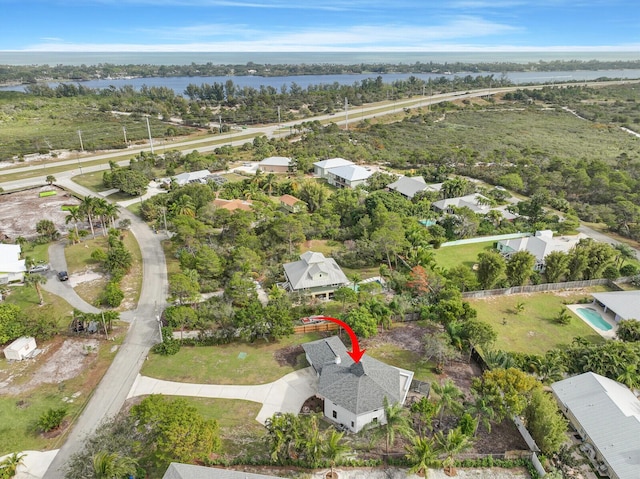 drone / aerial view with a water view