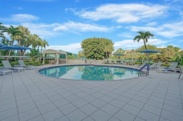 view of pool with a gazebo and a patio