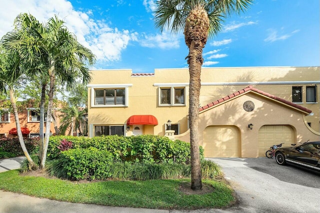 view of front of home with a garage