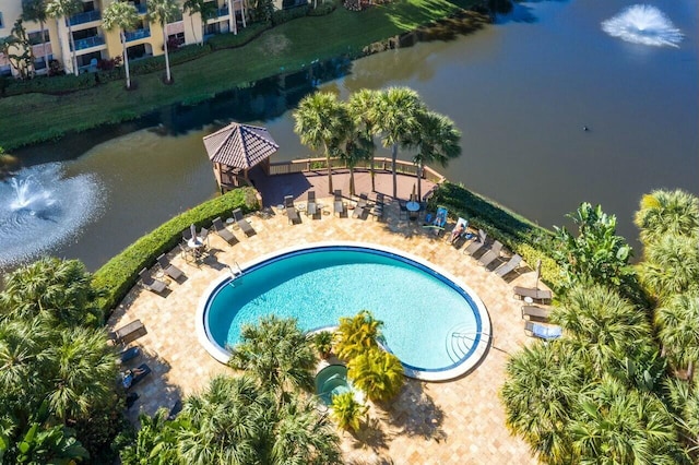 view of pool featuring a water view