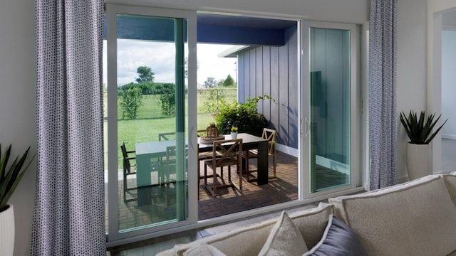 doorway to outside with hardwood / wood-style floors