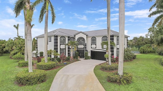 view of front facade with a front yard