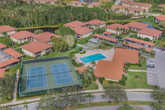 birds eye view of property with a residential view