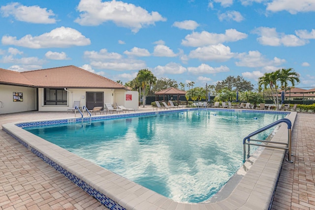 community pool featuring a patio