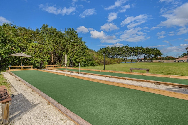 view of home's community featuring a lawn