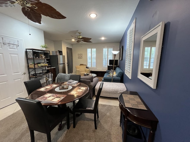 view of carpeted dining area