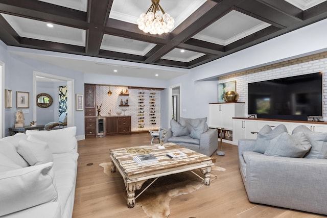 living room with light wood-type flooring, beverage cooler, beam ceiling, and coffered ceiling