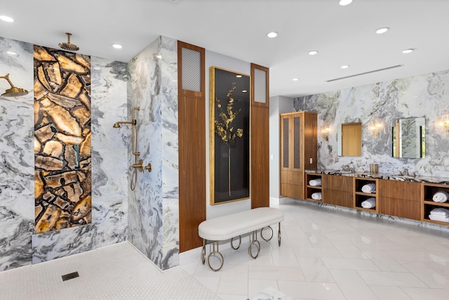 bathroom with a shower and vanity