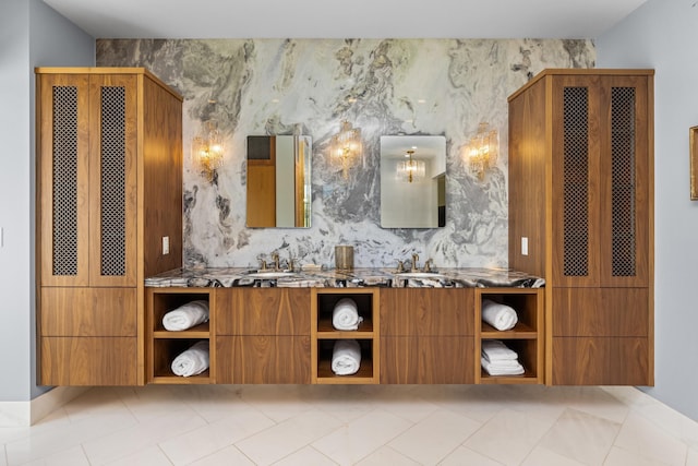 bathroom with tasteful backsplash and vanity