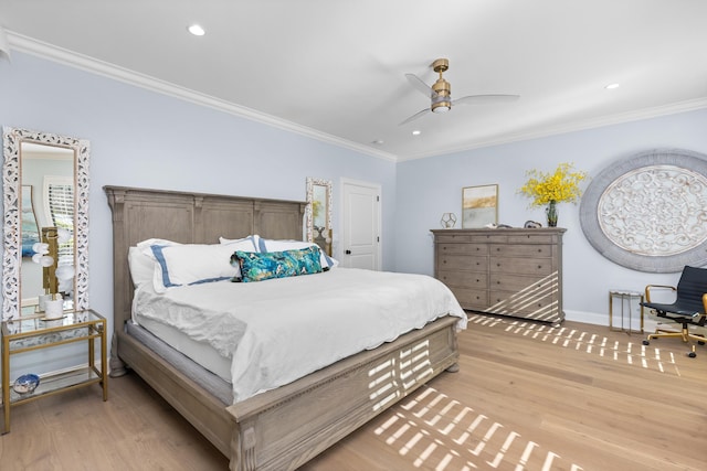 bedroom featuring crown molding, light hardwood / wood-style floors, and ceiling fan