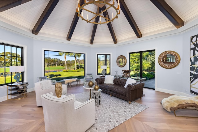 living room featuring high vaulted ceiling, beam ceiling, parquet floors, and a notable chandelier