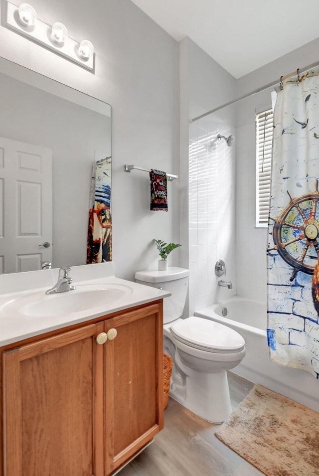 full bathroom with shower / bathtub combination with curtain, vanity, toilet, and wood-type flooring