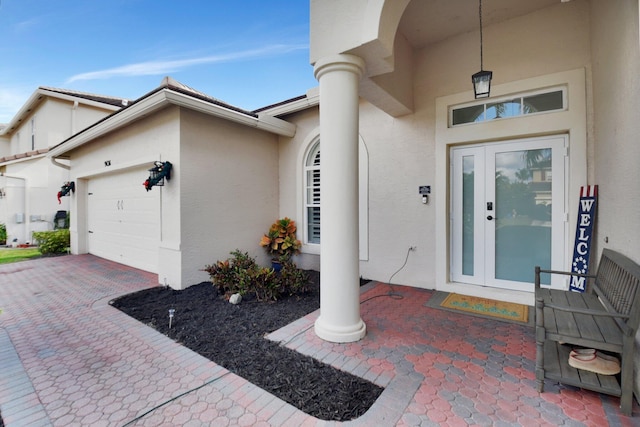 property entrance featuring a garage