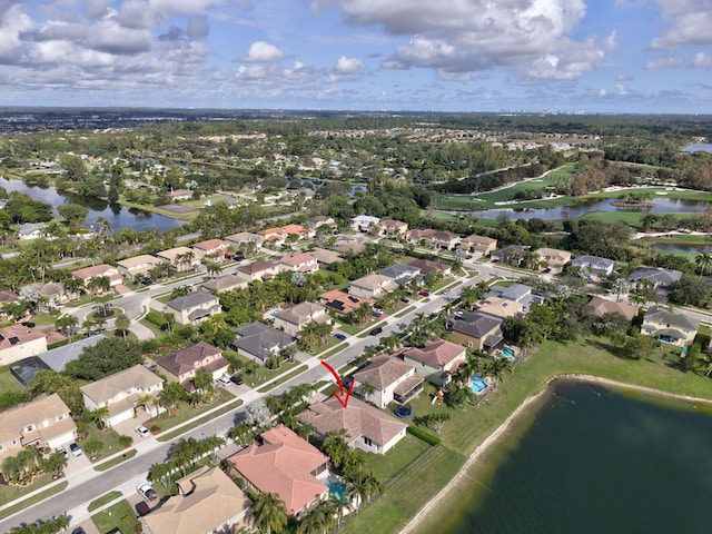 drone / aerial view with a water view